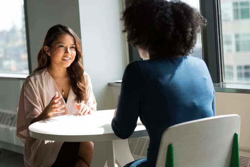 HR professional conducting candidate interview and onboarding consultation